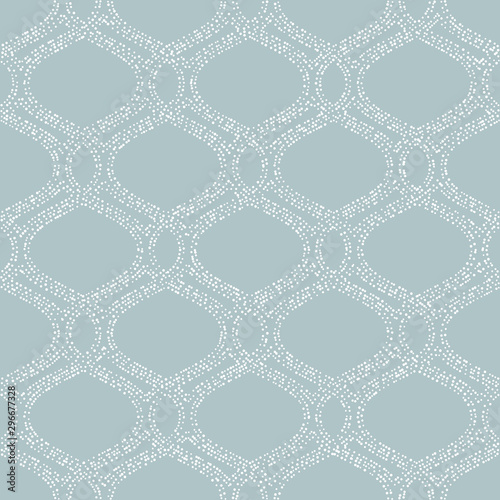 Seamless ornament. Modern background. Geometric modern light blue and white dotted pattern