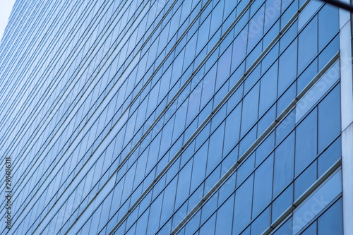 Blue glass windows of modern office building