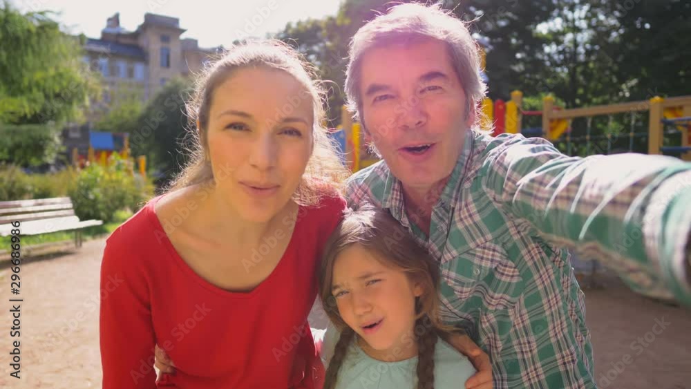 Happy family taking selfie Happy family taking selfie