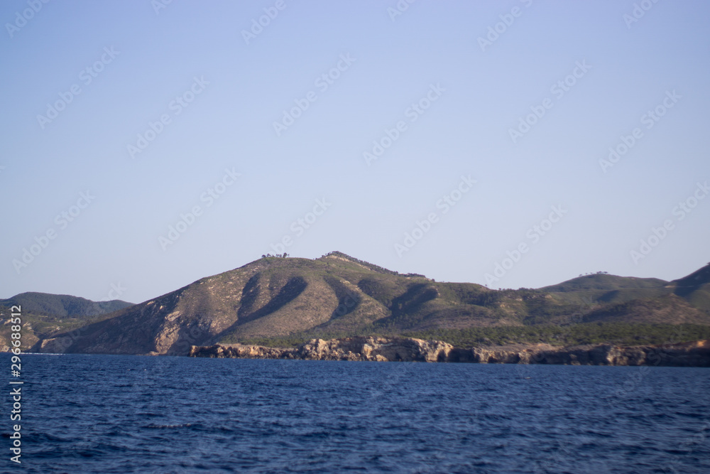 View from the yacht to the Balearic Islands. Beautiful landscape in the Mediterranean Sea View from the yacht to the Balearic Islands. Beautiful landscape in the Mediterranean Sea