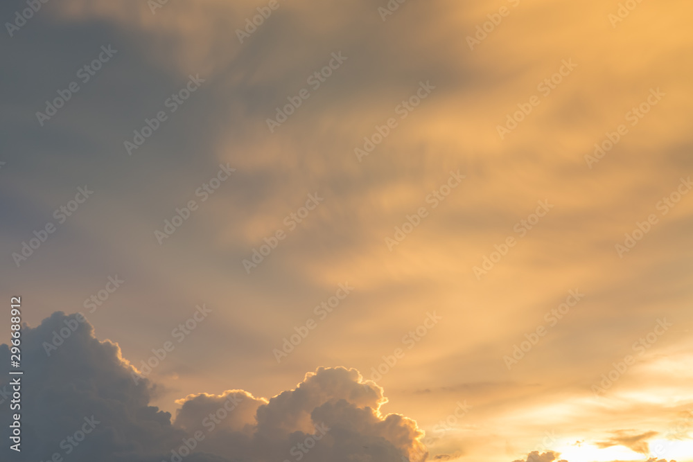 Golden sky and clouds before sunset