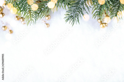 Closeup of Christmas tree with light, snow flake. Christmas and New Year holiday background. photo