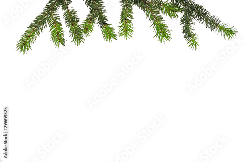 green spruce branch in natural cones and New Year s toys on a white background. Christmas card. Christmas background. space for text or advertisement.