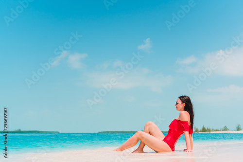 Young fashion woman in swimsuit on the beach