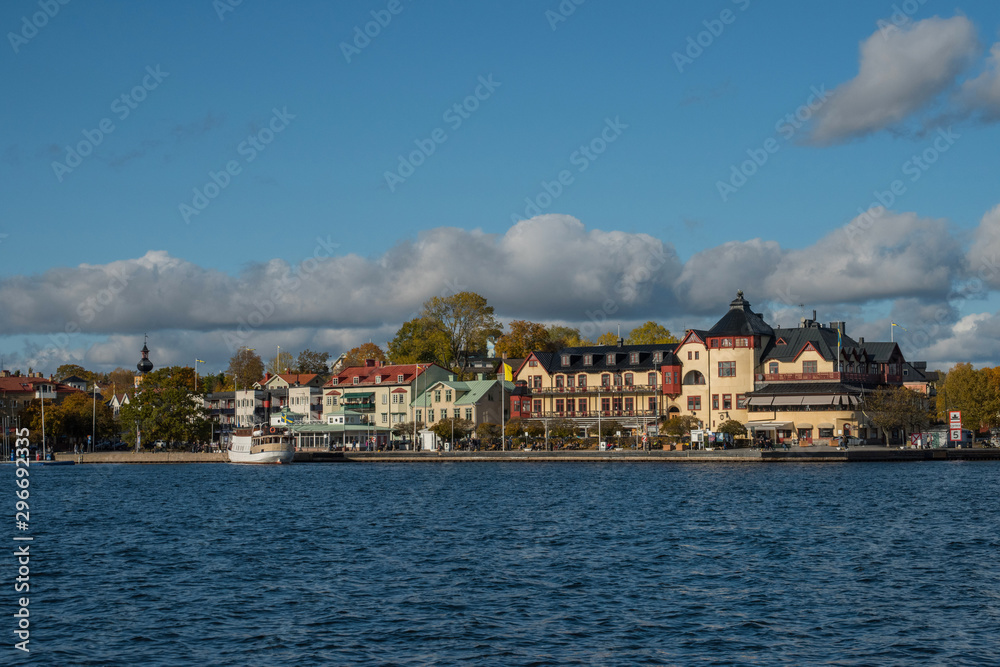 Autumn view at Vaxholm in the Stockholm archipelago, boats, ferries and fortress
