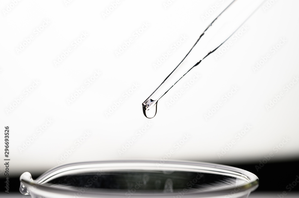 Drop the chemical into the beaker. Drop the chemical into the beaker.