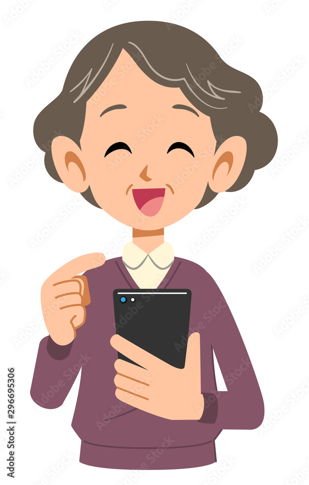 携帯電話を操作するシニアの女性の笑顔