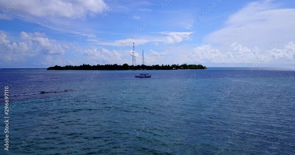single boat floating in the bay of the Philippines island. aerial drone dolly in shot single boat floating in the bay of the Philippines island. aerial drone dolly in shot