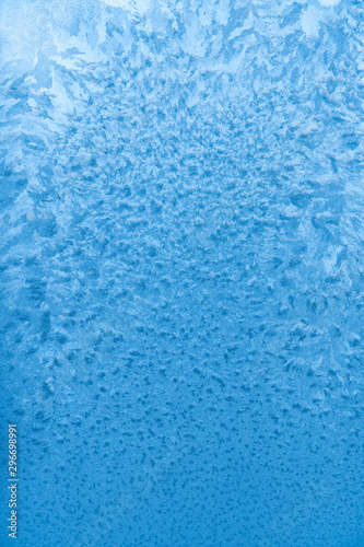 Frozen pattern. Icy water covered with snow crystals.