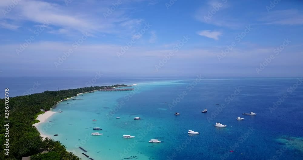 Small Islands Motu surrounded by boats, Aerial View, French Polynesia Small Islands Motu surrounded by boats, Aerial View, French Polynesia