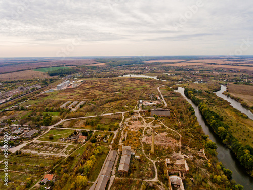 European village, river, forest. Aerial view.