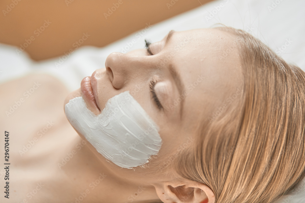 Beautiful young woman in cosmetic salon close up Beautiful young woman in cosmetic salon close up
