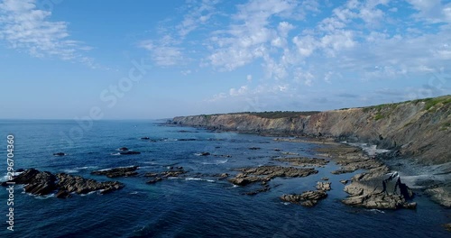 Aerial view of the coastline and cliffs near the Esteveira Beach in Aljezur, Algarve. photo