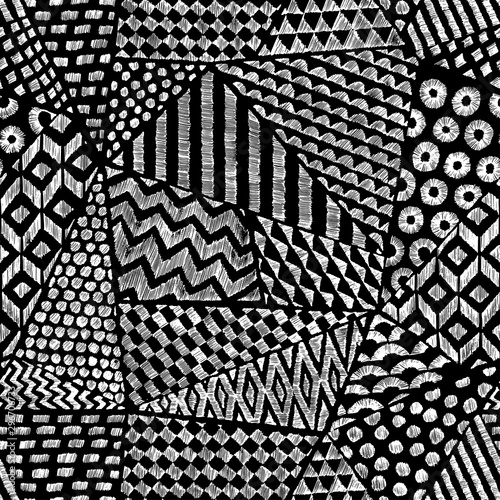 Seamless black and white pattern in patchwork style. Ethnic and tribal motifs. Pencil ornament. Grunge texture. Doodle print for textiles. Vector illustration.