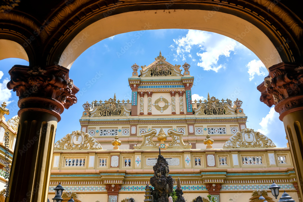Fototapeta premium View of the inside of the Vinh Trang Temple in My Tho, Vietnam with patterns of 19th-century culture in southern Vietnam