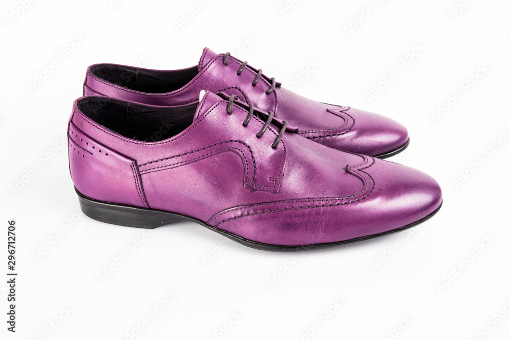 Pair of purple shoes isolated on white background.