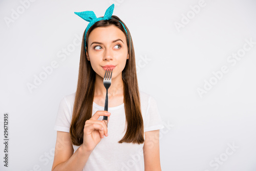 Hmm what eat. Portrait of thoughtful girl hold fork think have thoughts about decide decision choose choice prepare for meal dream wear vintage style outfit isolated over white color background photo