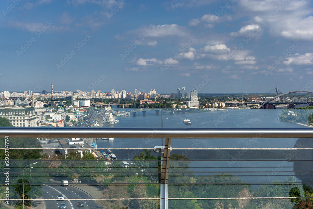 View on River Dnepr, bridge and city center of Kiev, Ukraine on a sunny day