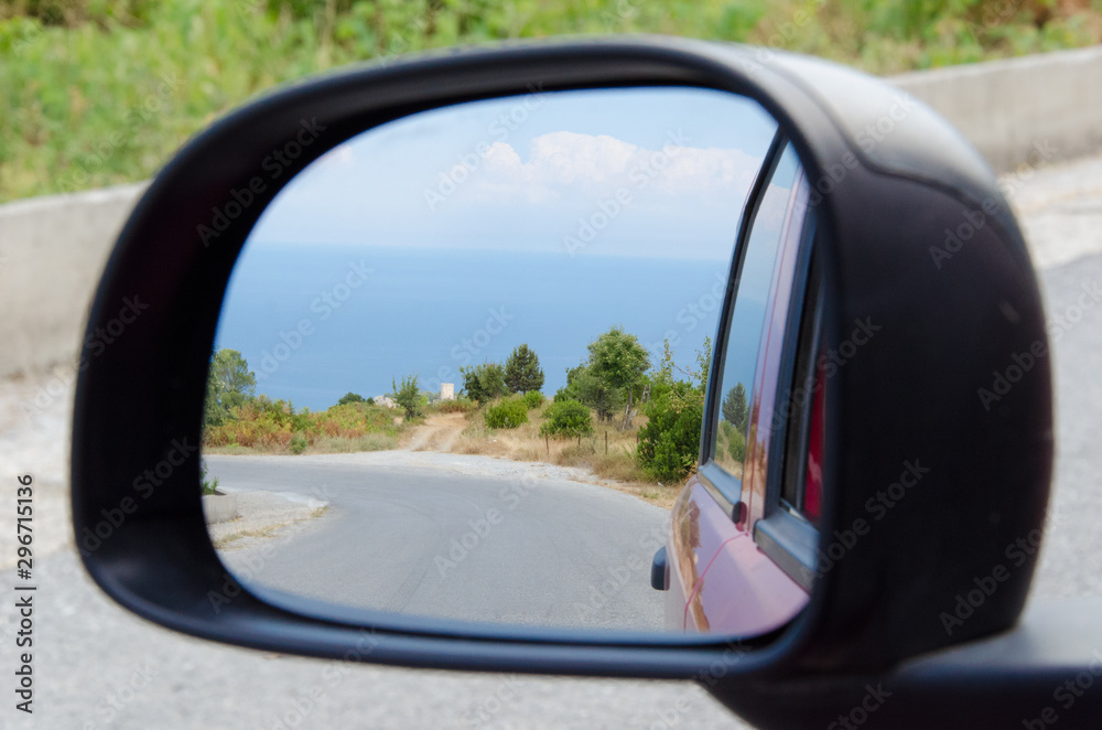 Greek street in the rearview mirror