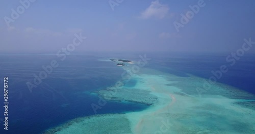 Wallpaper Mural Distant aerial view of a small island complex and a large shallow water area in the Maldives 4K Torontodigital.ca