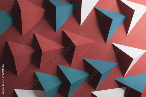 Composition with triangular shapes, red background