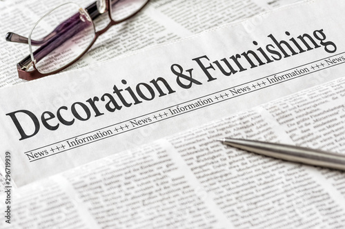 A newspaper with the headline Decoration and Furnishing
