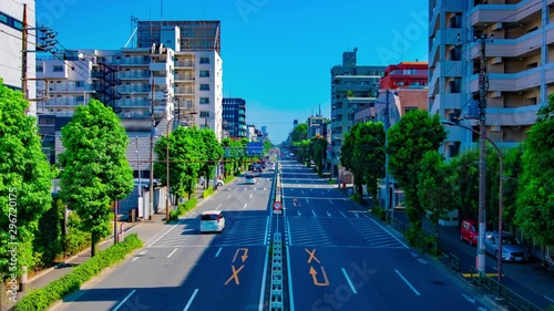 A timelapse of downtown street at Kanpachi avenue in Tokyo daytime wide shot zoom photo