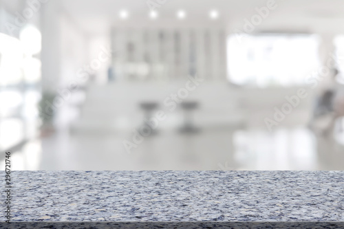 Marble table with register counter blurry background