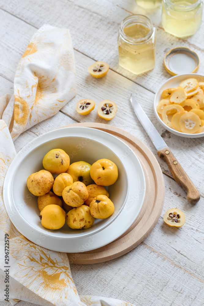 Preparing quince syrup for winter, a preserve of natural source of vitamin C