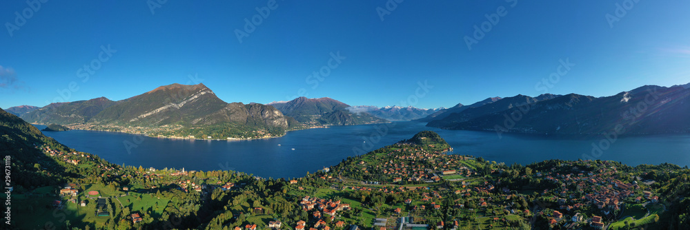 Panoramic view of Lake Como, the city of Bellagio. Aerial view. Autumn season. Alps covered in snow