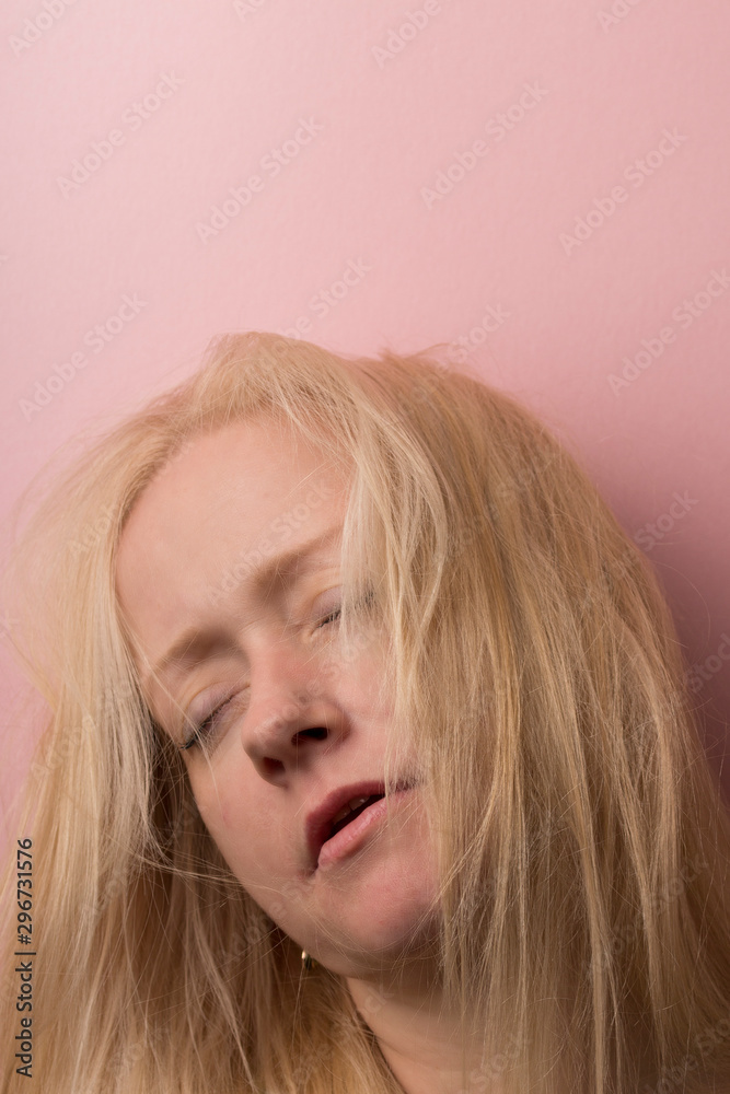 Portrait of the beautiful young woman with magnificent light hair, bangs on the face. close up. Portrait of the beautiful young woman with magnificent light hair, bangs on the face. close up.
