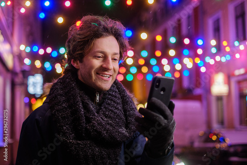Man making selfie on a cold winter evening