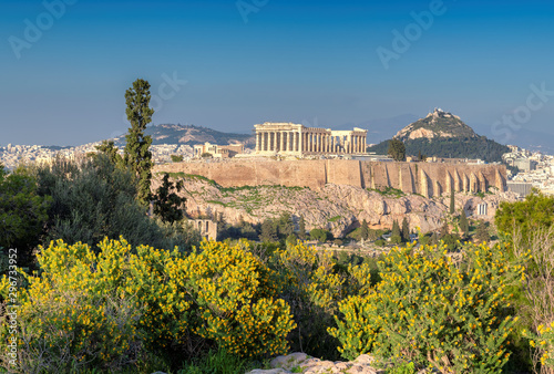 Acropolis of Athens in sunset, with the Parthenon Temple, Athens, Greece.