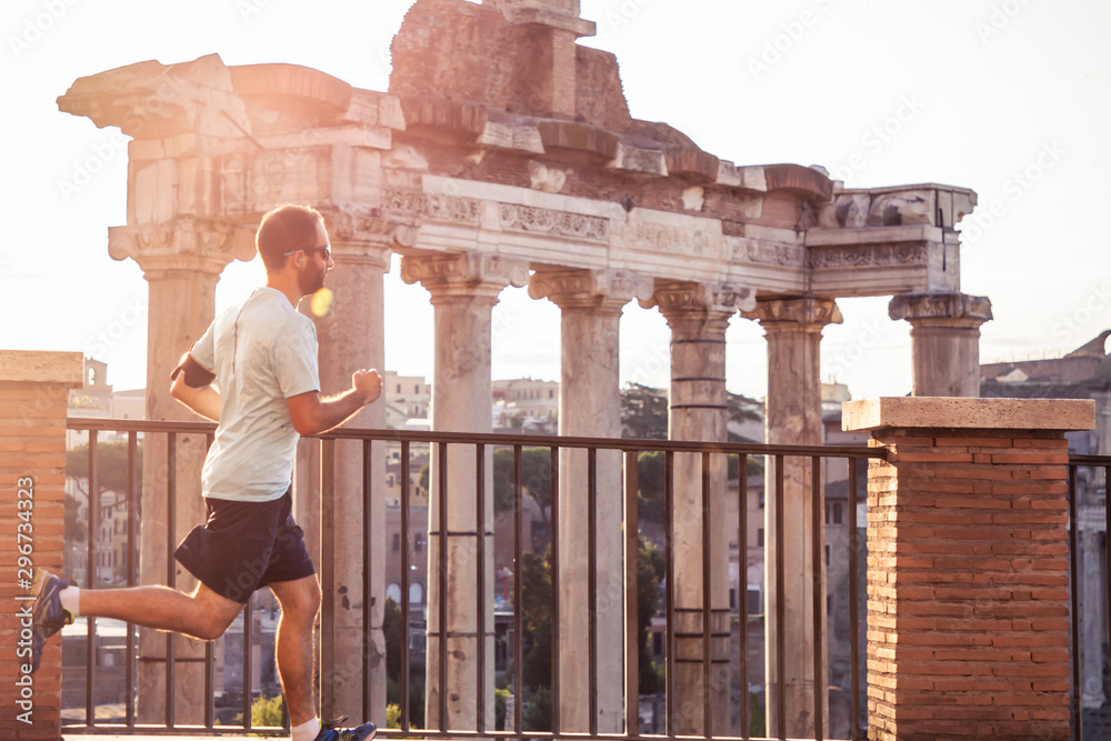 Young man running jogging in front of the Roman Forum at sunrise.  Historical imperial Foro Romano in Rome, Italy from panoramic point of  view. Stock Photo | Adobe Stock