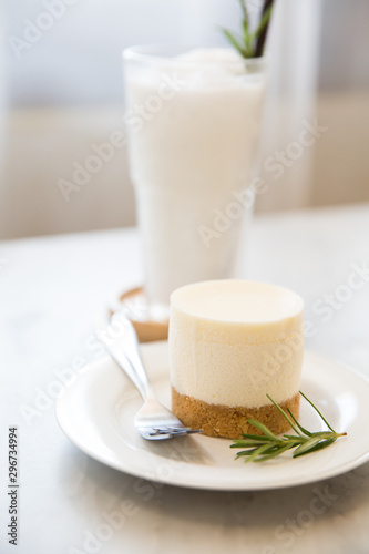 Mini Cheesecake and Coconut Smoothie on Table
