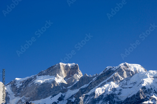 Landscape with snow mountains. Travel, alpinism concept. Copy space