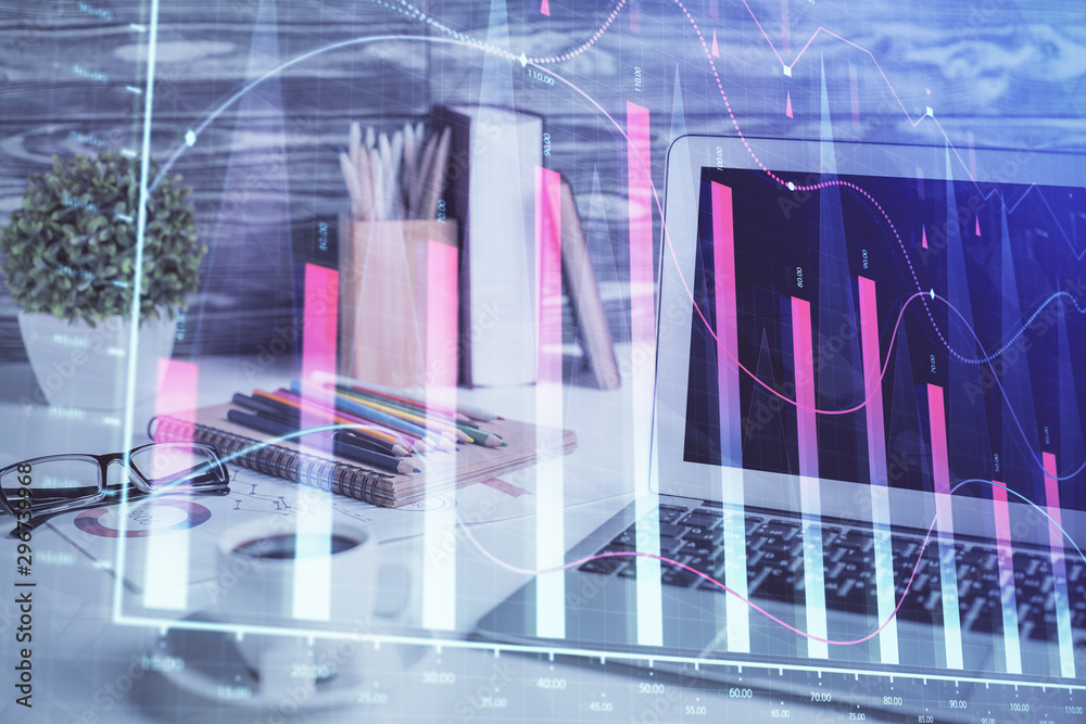 Stock market graph on background with desk and personal computer. Double exposure. Concept of financial analysis. Stock market graph on background with desk and personal computer. Double exposure. Concept of financial analysis.