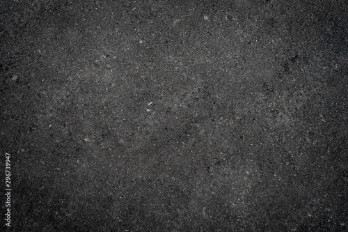 Dark grey stone texture. Background with rough surface