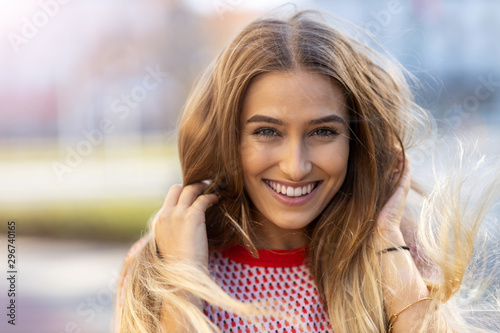 Portrait of beautiful young woman outdoors 