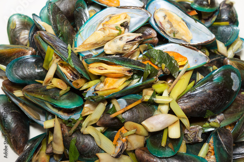 Steaming mussel with white plate
