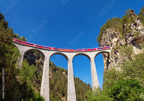Train crossing Landwasser Viaduct (Landwasserviadukt), Graubunden, Switzerland.