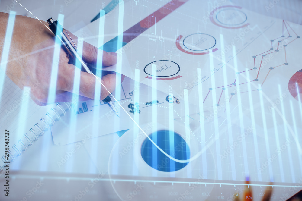 Fototapeta premium Multi exposure of man planing investment with stock market forex chart.