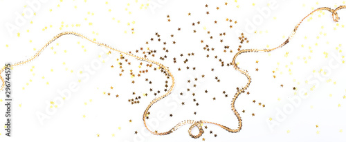 Festive white background with golden stars and sequins.