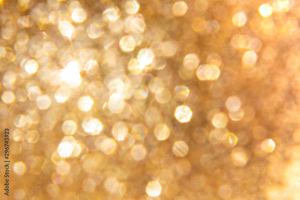 abstract background with small seized gold bokeh