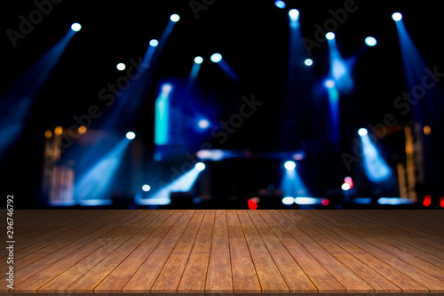 top desk with light bokeh in concert blur background,wooden table
