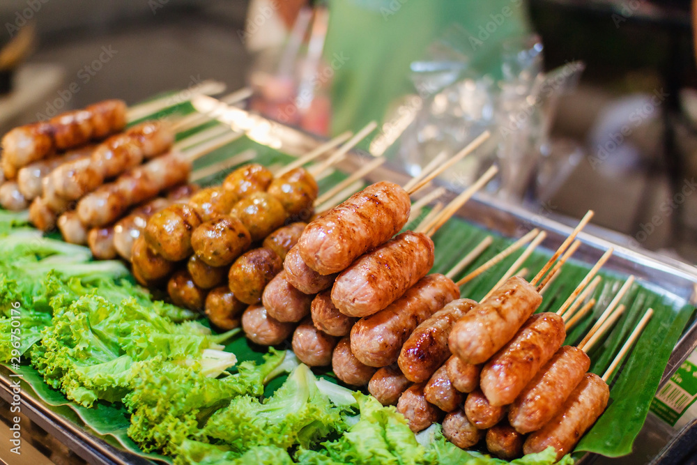 Thai street food. Sausage satay
