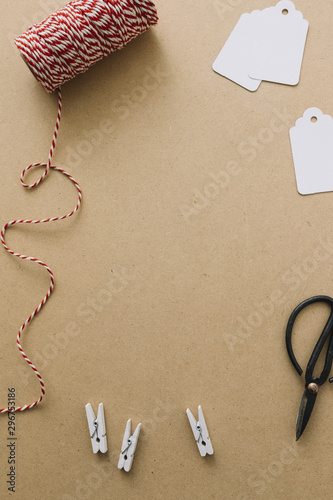 Christmas composition of red rope with scissors