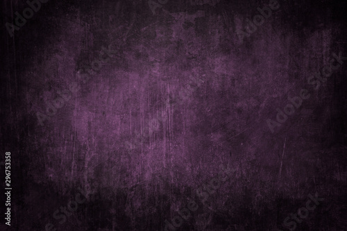 Dark purple grungy background or texture