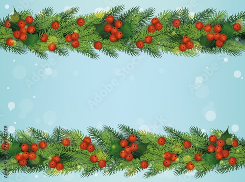 Christmas and New Year holiday decoration - pine tree branches with red berries photo
