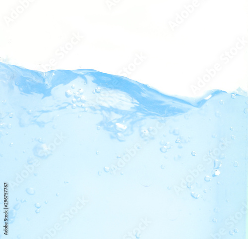 side view of clean blue water surface with air bubbles on white background